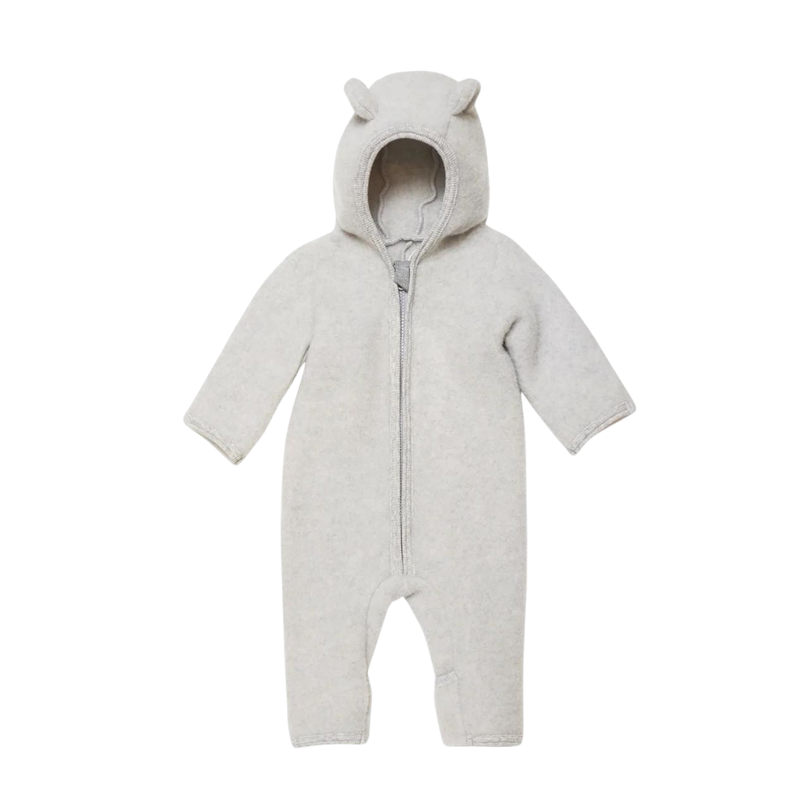 Soft and comfortable, this breathable jumpsuit will keep your little one warm and dry. Fold over mitts, and convertible footie. Made from merino wool, it can be worn indoors or out. Designed in Denmark, Made in Poland.

- 100% merino wool

- OEKO-tex certified

Size chart

2-4 months = 56/62
6-9 months = 68/74
Ships to US and Canada Duty Free