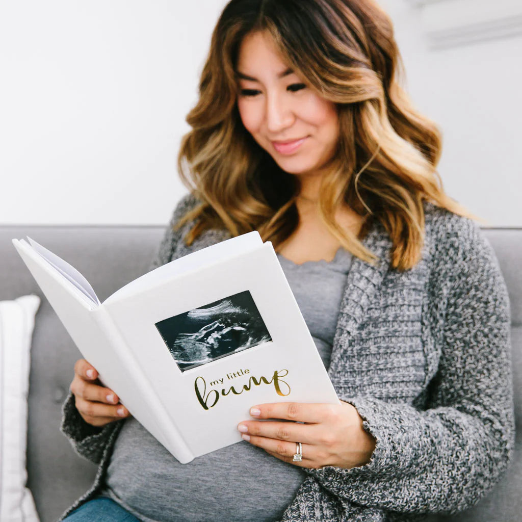 Record every special moment of your pregnancy with Pearhead’s pregnancy journal Ideal for gifting at baby showers With 50+ pages and a 4” x 5” photo insert, 